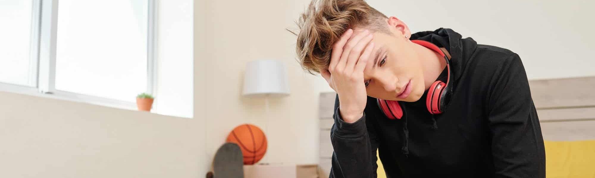Boy suffering from headache